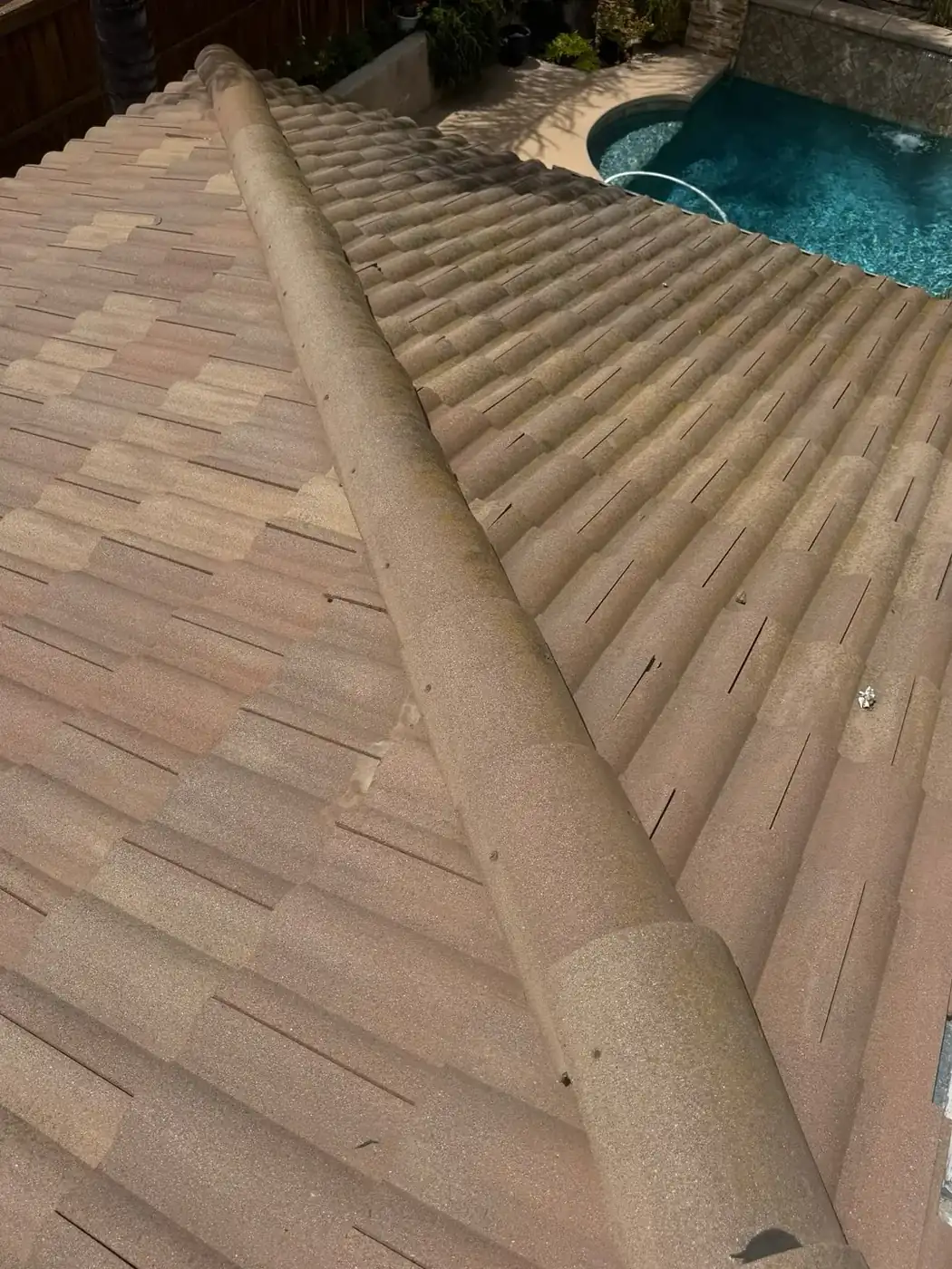 Tile roof valley repair and re-flashing