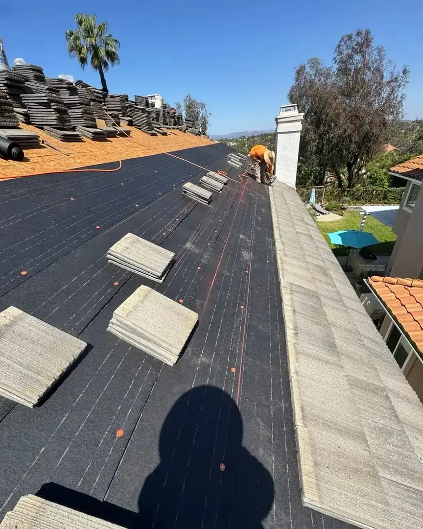 Tile roof replacement in progress