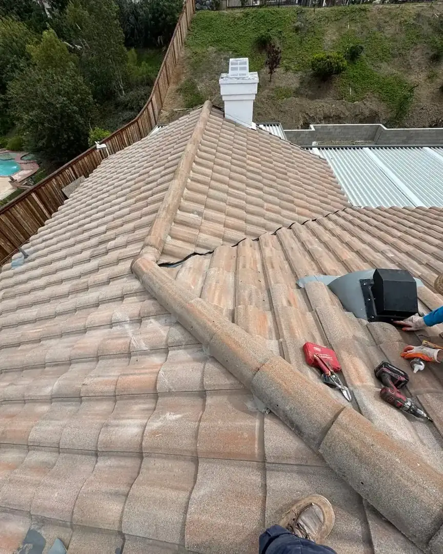 Roof flashing replacement on a tile roof