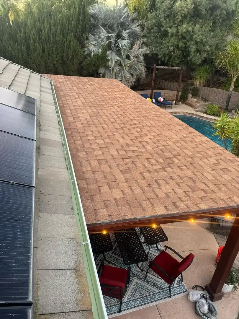 Roofer completing an exterior roof repair